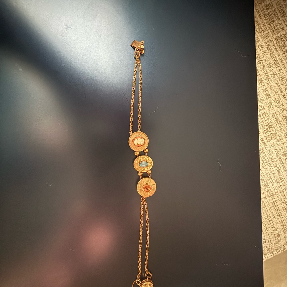 Gold and Blue Elegant Bracelet with Intricate Design